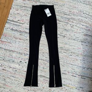 Black Zara leggings with zipper slit hem